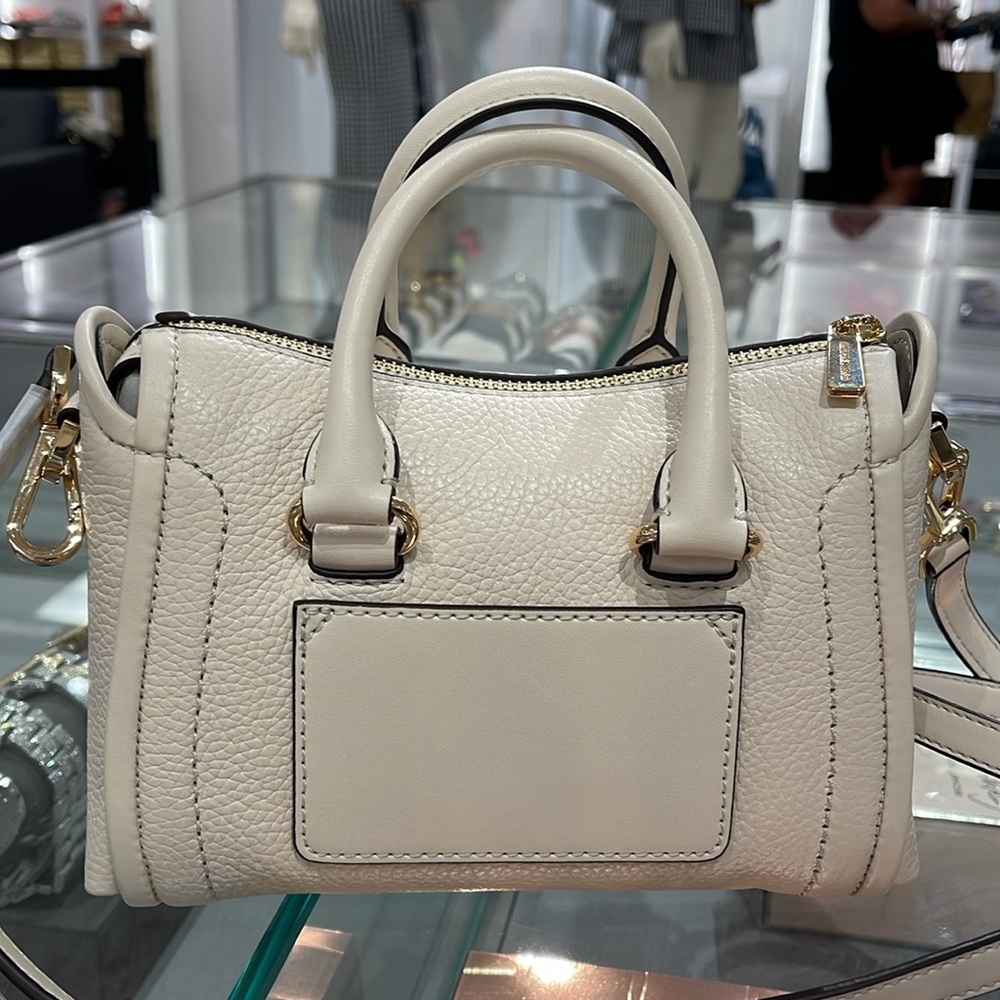 Michael Kors Carine Extra-Small Pebbled Leather Satchel Crossbody 
Lt Cream 
NWT - Picture 9 of 16